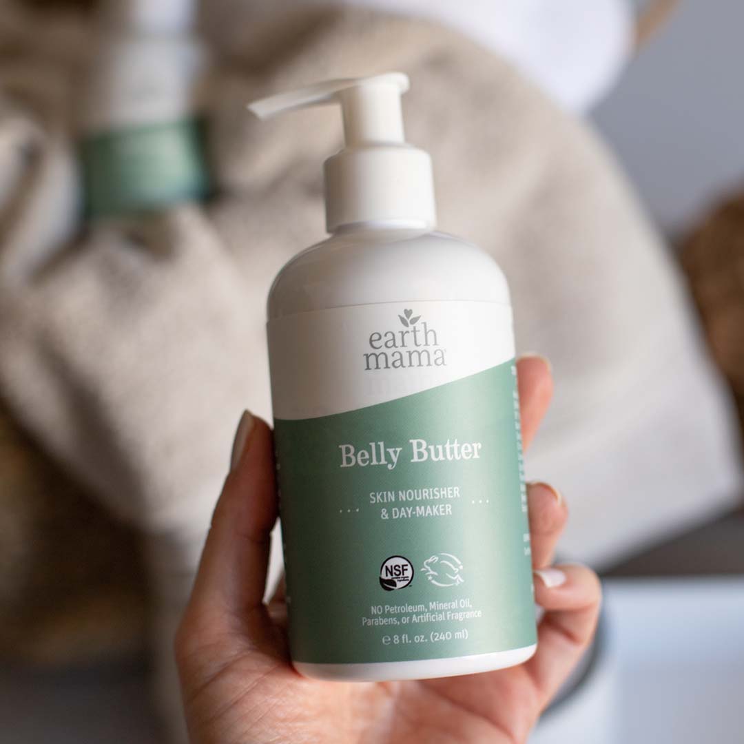 Earth Mama Belly Butter in hand